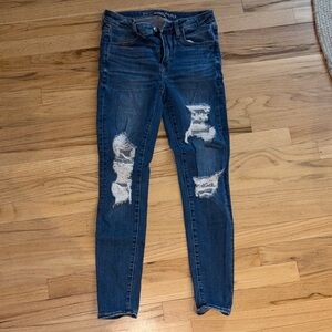 Distressed American Eagle High Rise Skinny Blue Jeans